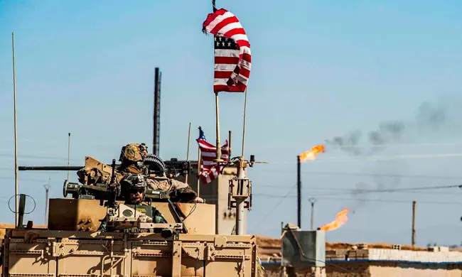 US Occupation Forces in Syria Transport ISIS Members to a US Base