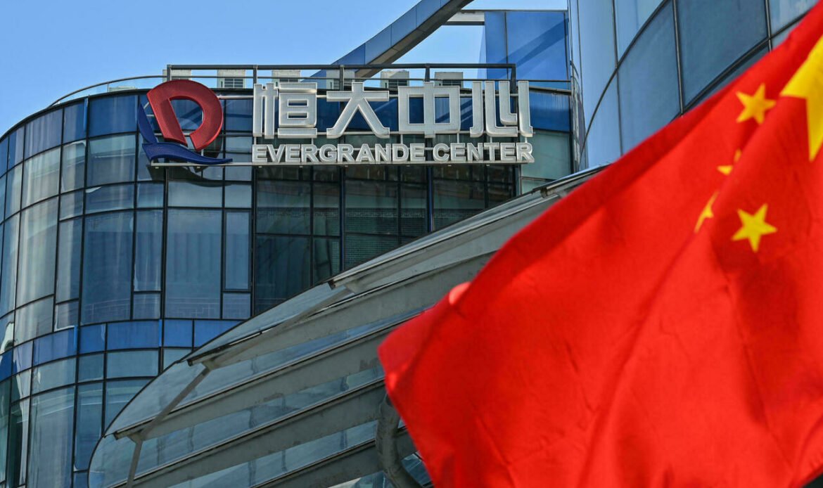 Beleaguered property giant Evergrande makes key offshore interest payment