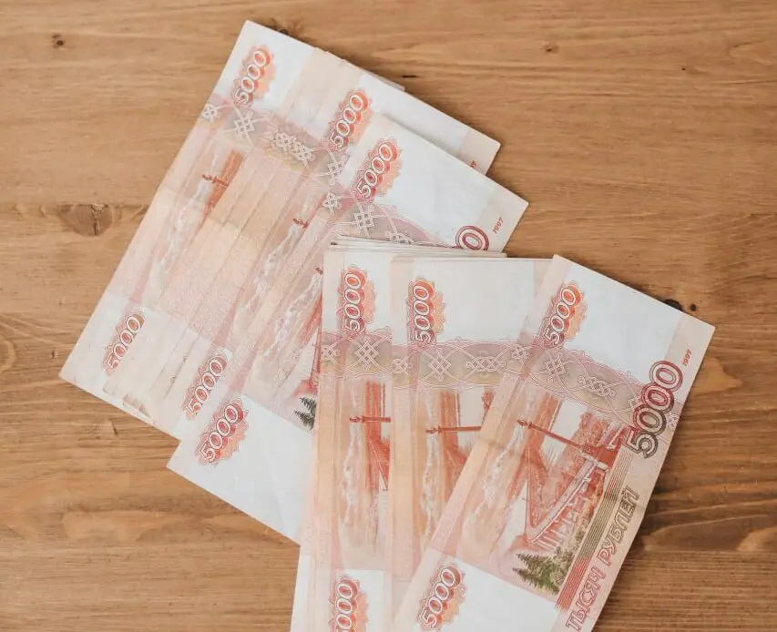 Russia and Iran to boost transactions in national currencies – official.