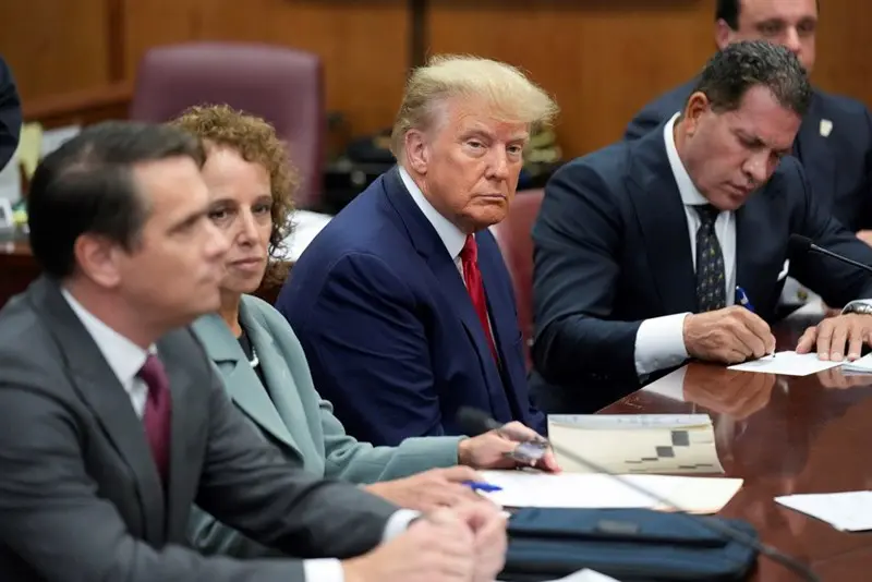 Trump charged with falsifying business records, trial set in 2024: CNN