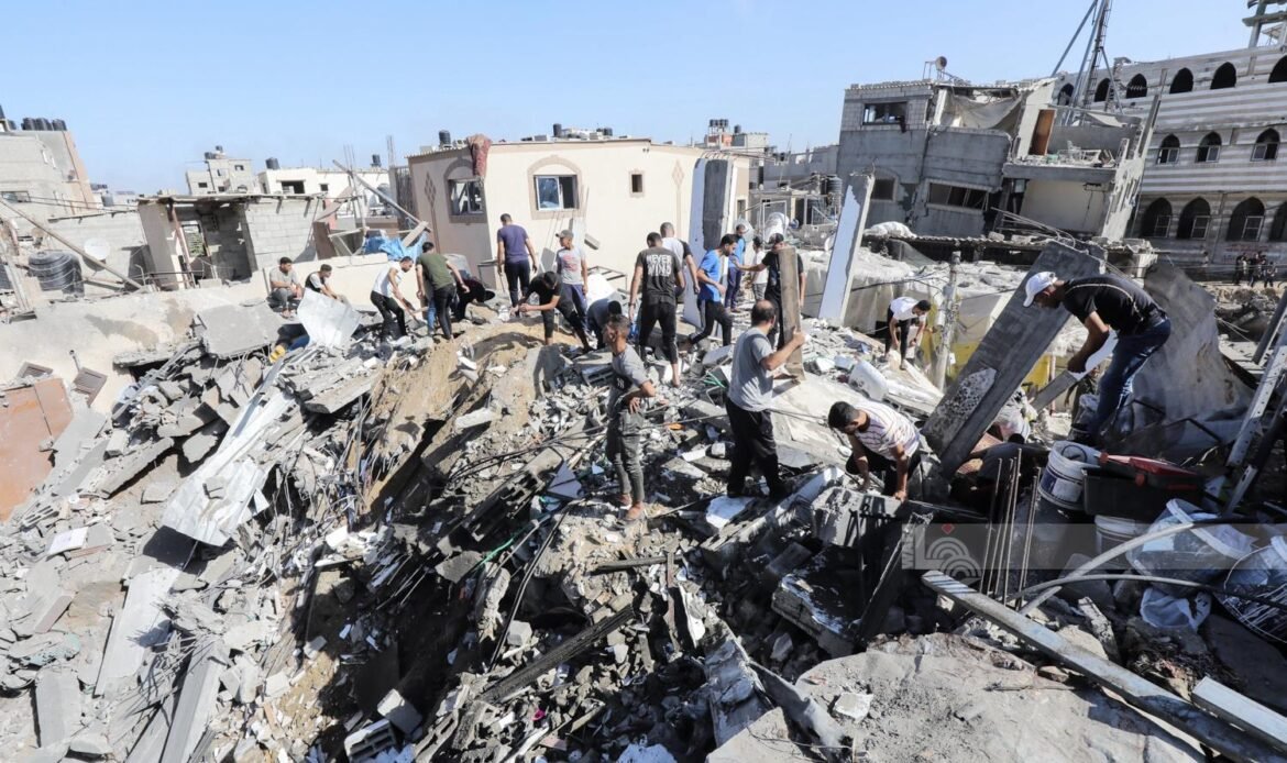 At least 13 killed, dozens wounded in Israeli airstrikes at homes in north and central Gaza Strip