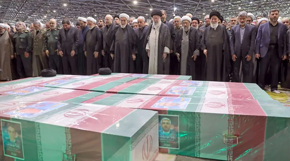 Khamenei leads prayers of mourners gather for Raeisi funeral