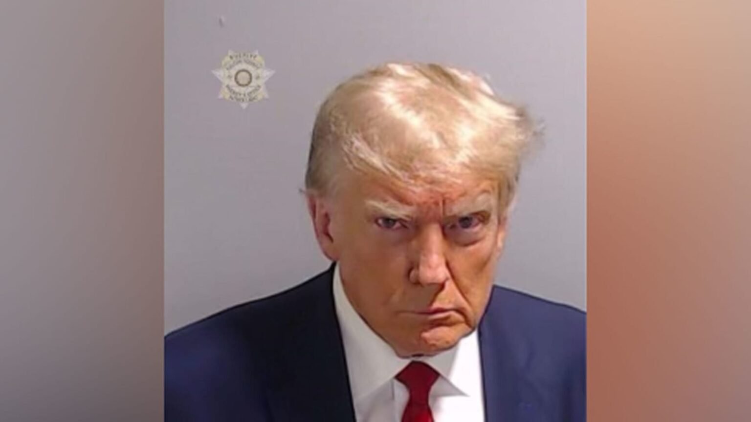 The Story Behind Trump's Arrest Photo at the White House